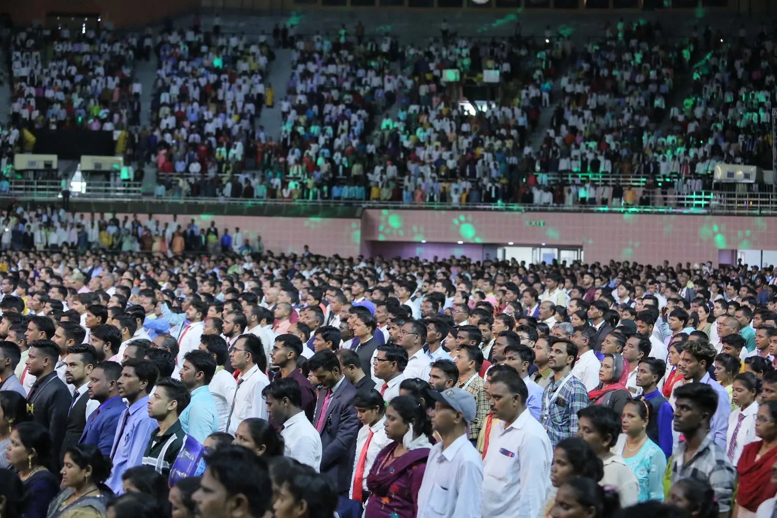 Large corporate conference audience filling an arena in Delhi NCR