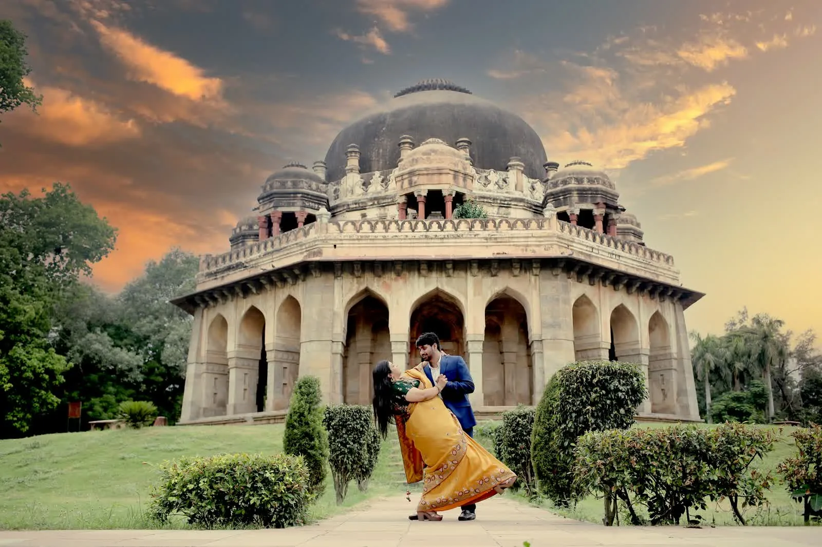 Pre-wedding couple portrait at a Lodhi-era domed tomb at sunset, Delhi